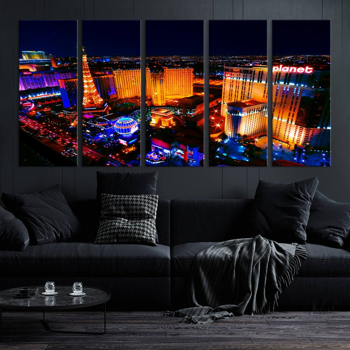 Las Vegas Wall Art Canvas Print showcases a dynamic and luminous cityscape at night with tall buildings and bustling streets. Expertly printed on museum-quality canvas, this gallery-wrapped artwork is enhanced with a UV-protective coating to ensure lasting brilliance.