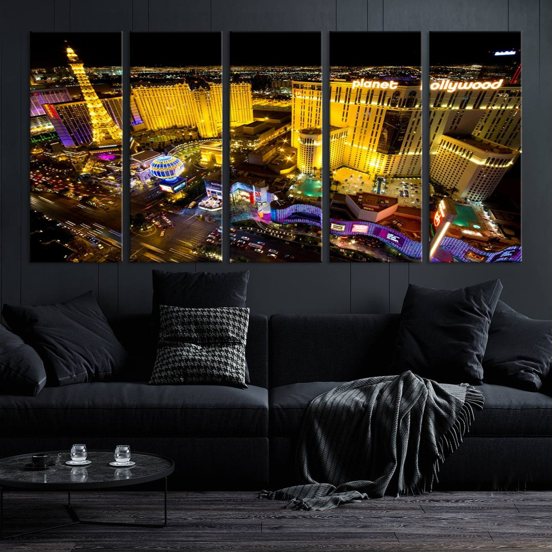 The modern living room features a Las Vegas Wall Art Canvas Print, a museum-quality triptych showcasing a vibrant cityscape with neon lights.