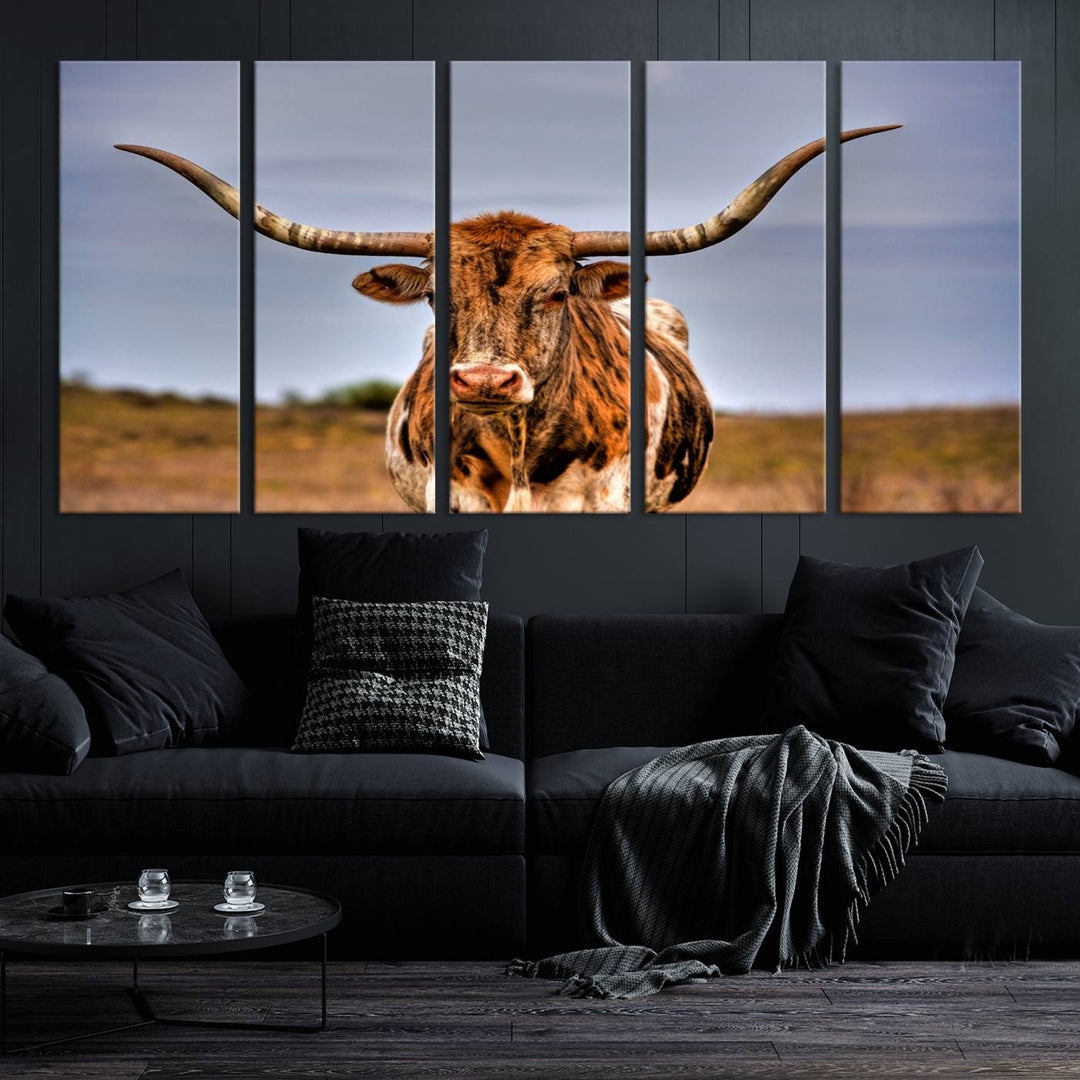 The Texas Longhorn Wall Art Print, a triptych canvas artwork depicting a longhorn bull in a field, features a gallery-quality finish.