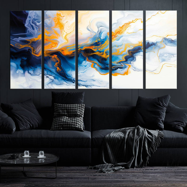 A stunning Fluid Alcohol Ink Wall Art with Gold Wall Art Canvas Print, featuring vibrant blue, orange, and white swirls, adorns the wall. This gallery-quality finish adds an exquisite touch to any living space.