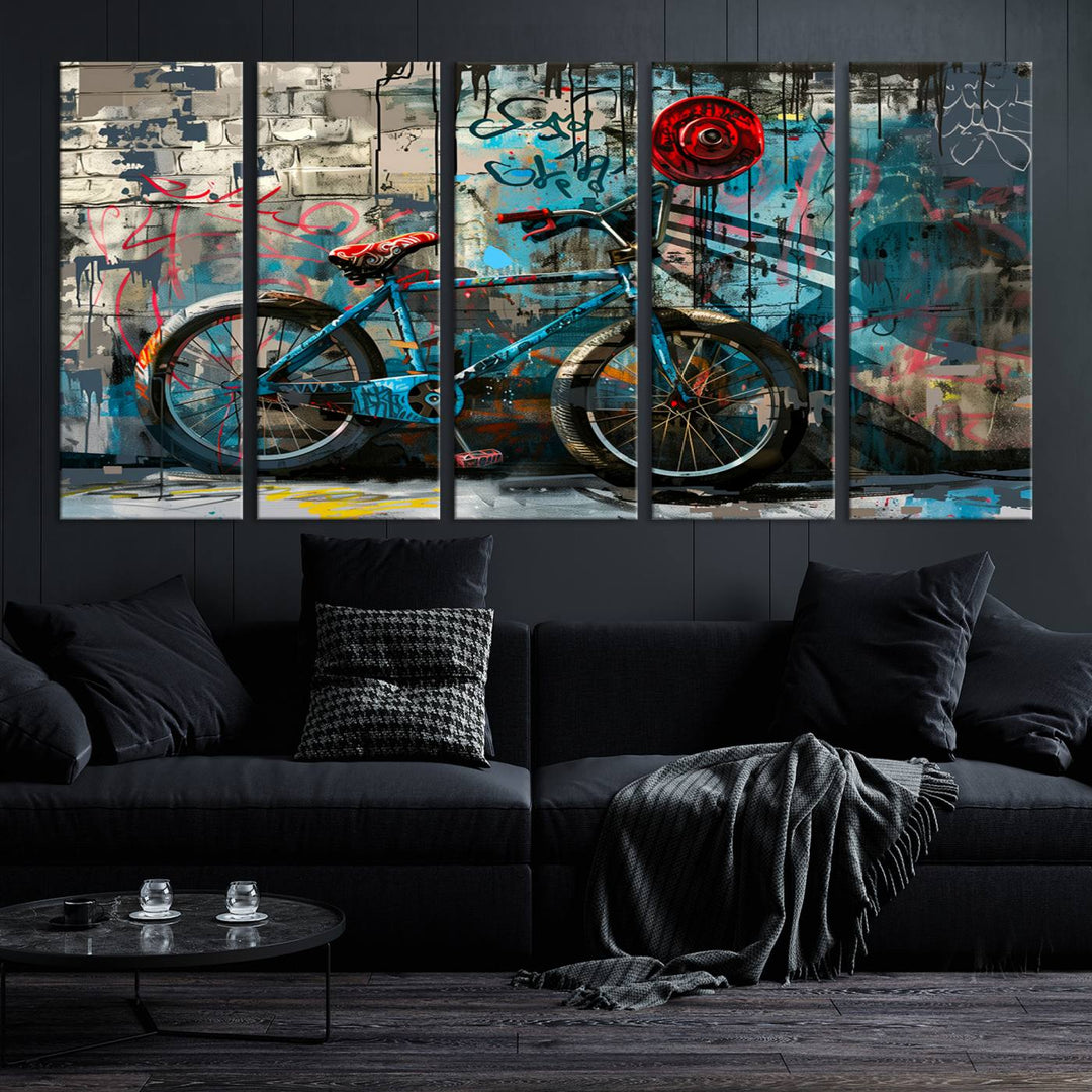 A modern living room features a triptych wall art of an abstract bicycle, designed in a graffiti style on a brick wall. This piece is expertly crafted on the Abstract Bicycle Wall Art Canvas Print, offering a premium canvas that ensures a gallery-quality finish.