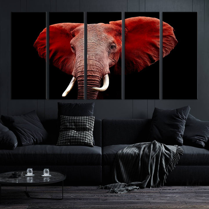 A Wall Art Canvas Print in the modern living room features a three-panel premium design of a red elephant face.