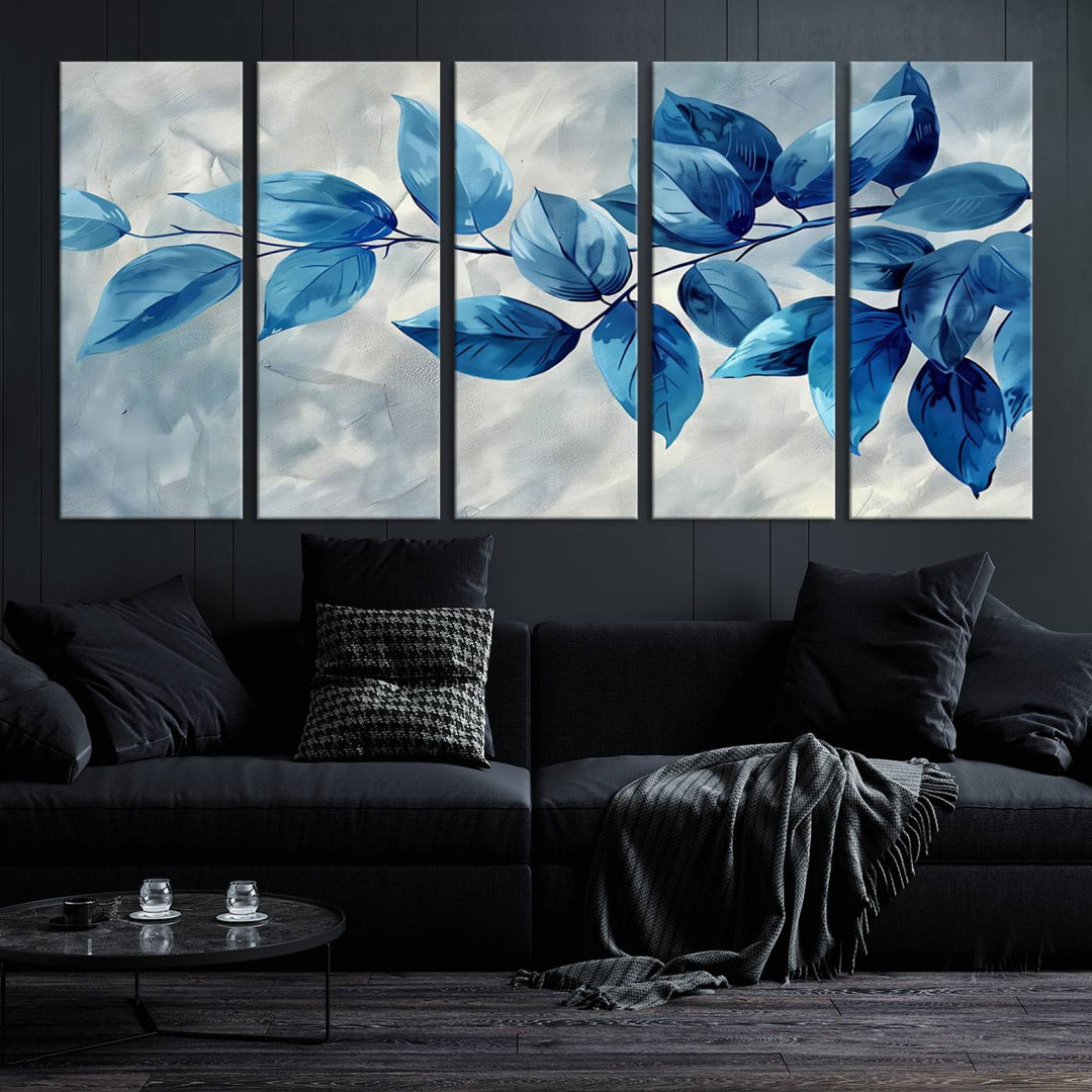 A Blue Leaf Abstract Wall Art Canvas Print, featuring a textured background and gallery-quality finish, is displayed.