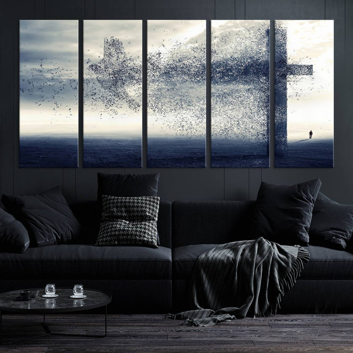 The "Jesus and the Fading Cross – Symbol of Faith" framed canvas print beautifully depicts a cross formed by birds against a moody sky above an ocean. This piece of Christian wall art infuses spirituality into the minimalist space.