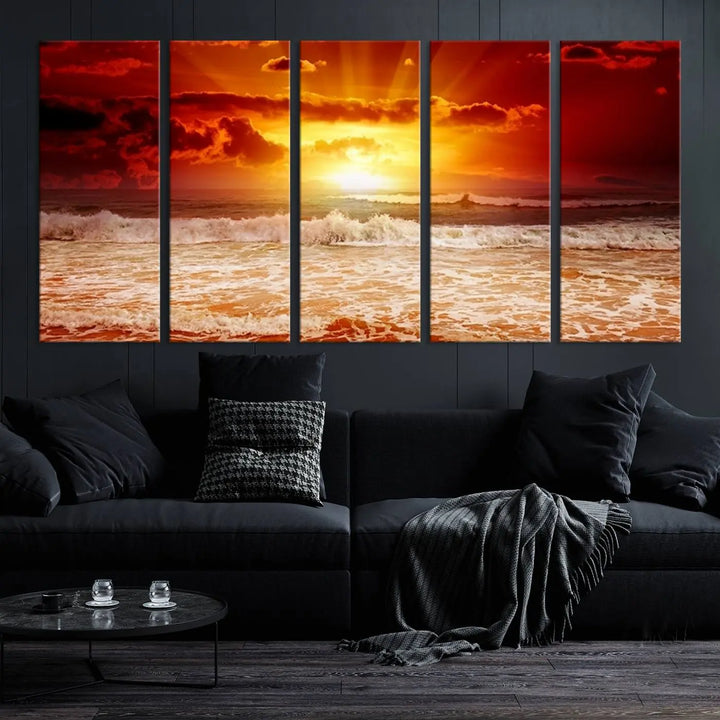 In a modern living room, the vibrant "Wall Art Canvas Perfect Sunset Turns Colour of Sea and Sky to Red," printed on museum-quality canvas, stands out. A floor lamp casts warm light over the ready-to-hang artwork, which includes a UV-protective coating to ensure lasting brilliance.