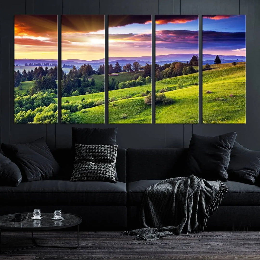 The room features a large triptych of the Green Hills and Sunset Wall Art Print, showcasing a scenic landscape with lush greenery and a vibrant sky.