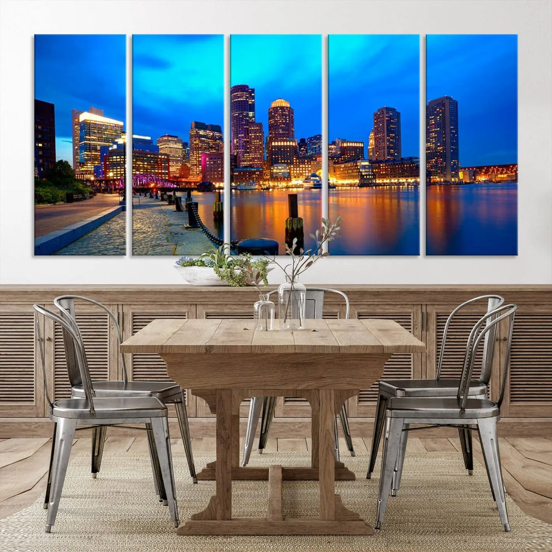 A triptych of the "Boston City Lights Night Blue Skyline Cityscape View Wall Art Canvas Print" adorns the wall. This museum-quality canvas artwork is ready to hang and includes a UV-protective coating for lasting brilliance.