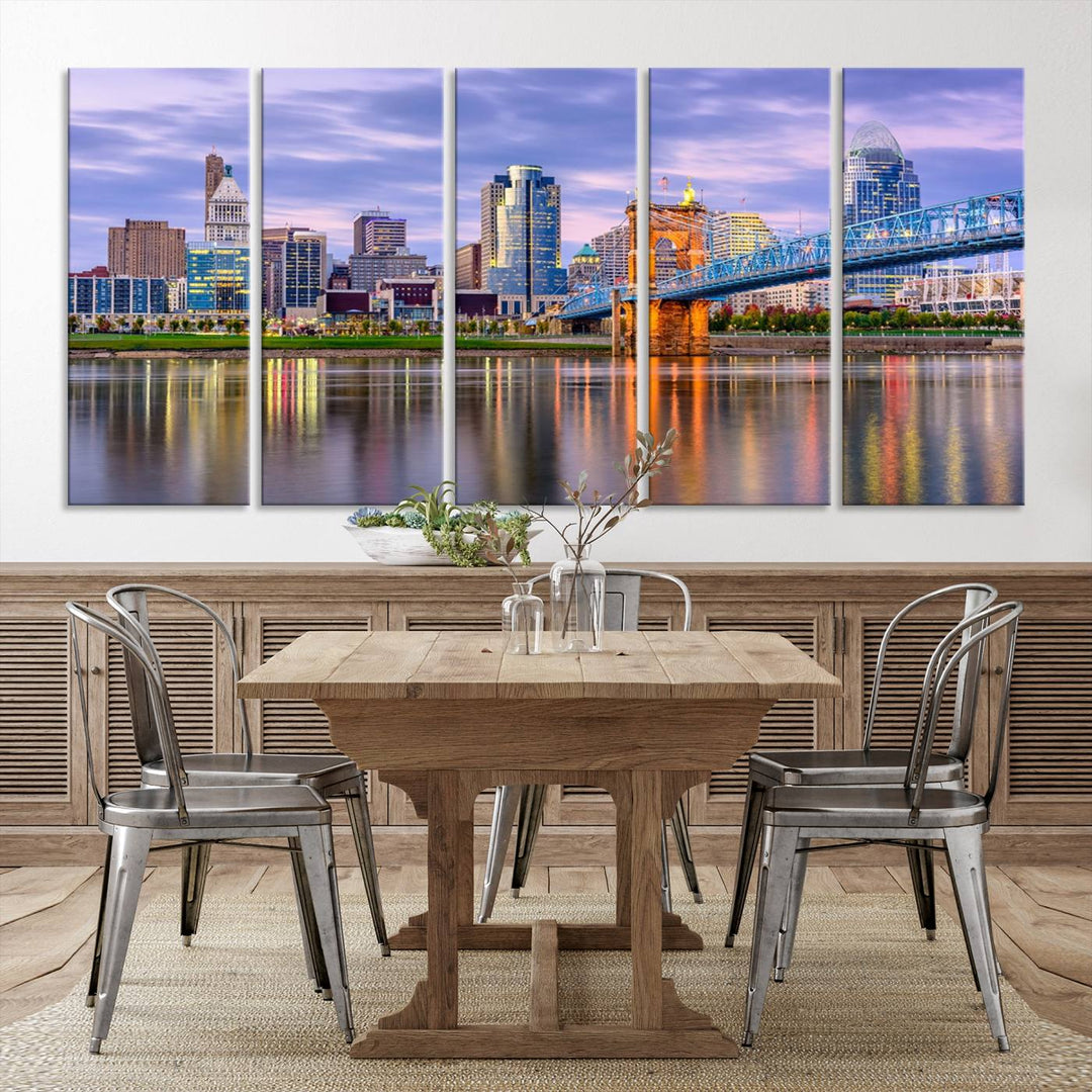 The wall art titled "Cincinnati City Lights Sunset Purple Cloudy Skyline Cityscape View" is beautifully printed on museum-quality canvases with a UV-protective coating and is ready to hang.