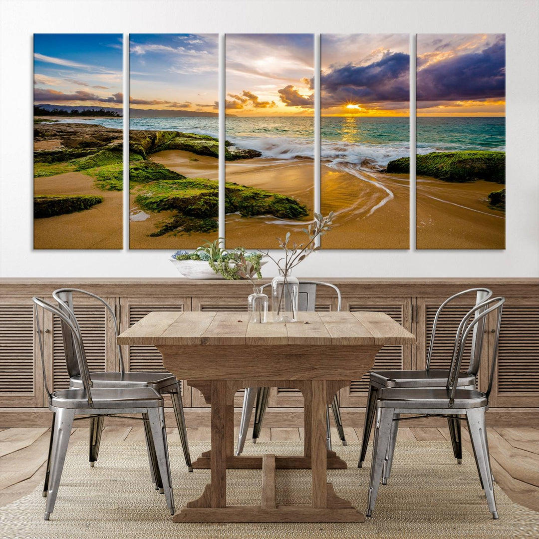 The Sunset Beach Wall Art Canvas Print is a gallery-wrapped triptych showcasing a beach scene with mossy rocks and a vibrant sunset. Made from museum-quality canvas and featuring a UV-protective coating, it elegantly provides both beauty and durability.