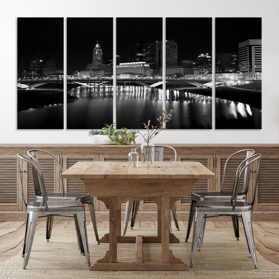 The living room features the "Columbus City Lights Skyline Black and White Wall Art Cityscape Canvas Print" above a coffee table. This artwork is presented as a triptych on museum-quality canvases with UV-protective coating.