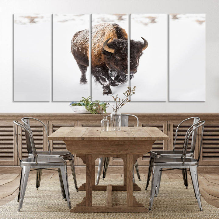 The Bison Winter Wall Art Canvas Print for Farmhouse Decor is displayed as a triptych in the living room. This artwork, printed on museum-quality canvases with a UV-protective coating to maintain its vibrant colors, is the focal point of the space.