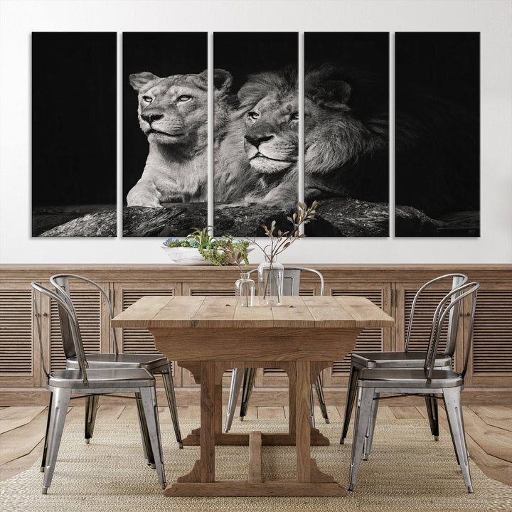 The elegant wildlife portrait, "Lion Couple Canvas Wall Art Print," featuring a black and white depiction of a lion family, majestically decorates the living room wall.