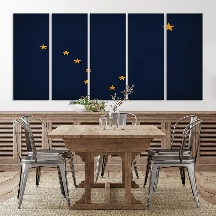 A contemporary living room featuring a triptych artwork of stars on a navy background, accentuated by the striking Alaska States Flag Wall Art Canvas Print.