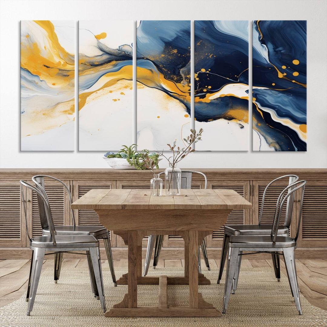 The Blue and Gold Abstract Fluid Canvas Art, with its swirling patterns, adorns the wall. This modern wall art beautifully complements the contemporary interior decor, adding an elegant touch with its rich blue, gold, and white tones.