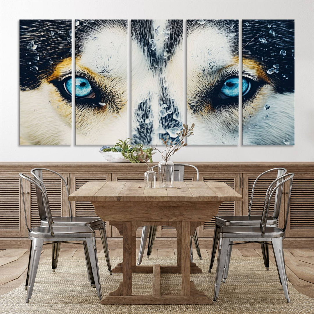 The captivating "Winter Siberian Husky Wolf EYE Wall Art Canvas Print" showcases the striking blue eyes of the animal portrait.