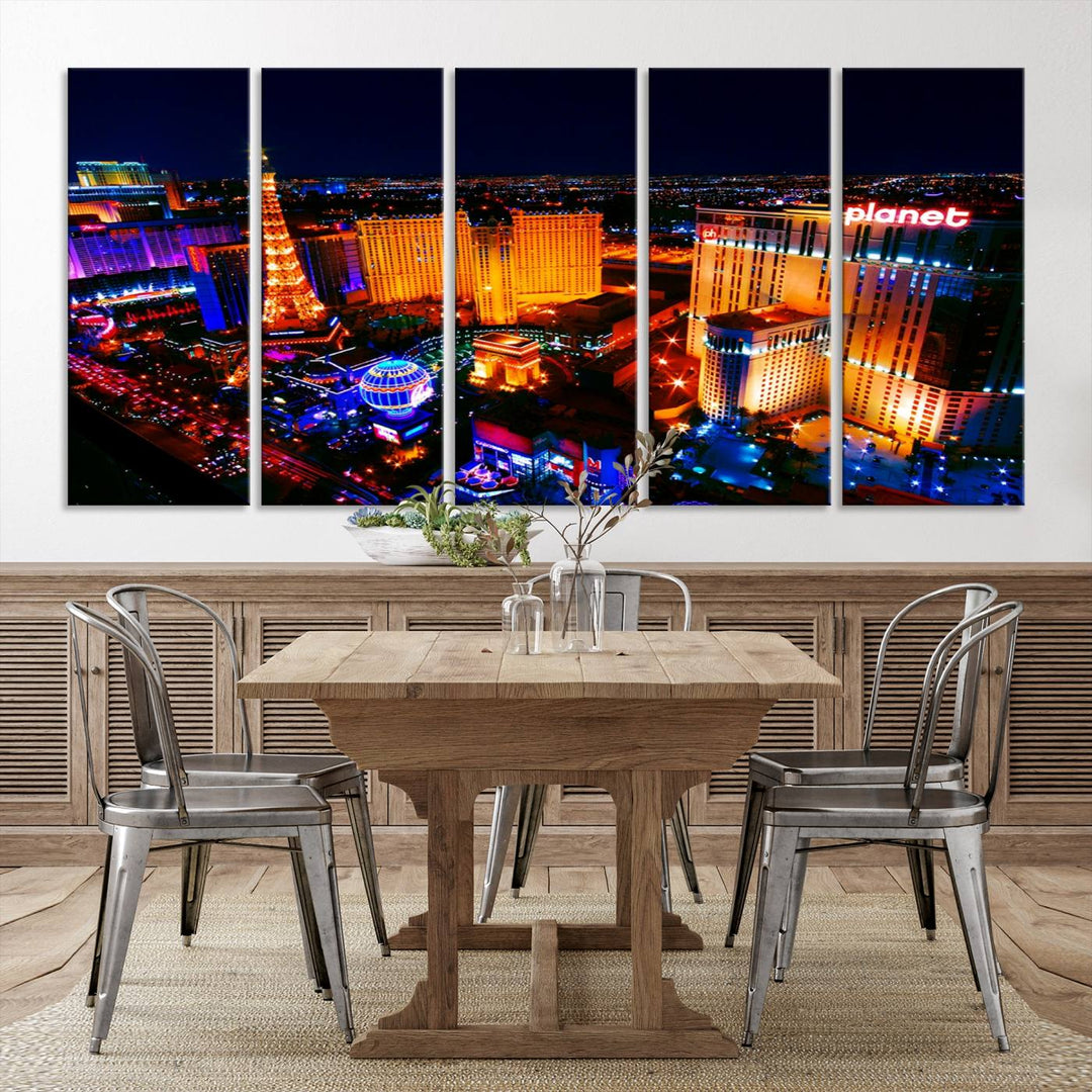 Las Vegas Wall Art Canvas Print showcases a dynamic and luminous cityscape at night with tall buildings and bustling streets. Expertly printed on museum-quality canvas, this gallery-wrapped artwork is enhanced with a UV-protective coating to ensure lasting brilliance.