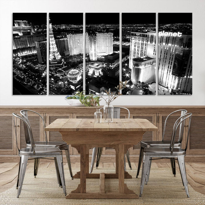 The Las Vegas Wall Art Canvas Print is a black and white triptych that showcases a city skyline at night. Crafted on museum-quality canvas with a UV-protective coating, it serves as an elegant and ready-to-hang focal point in the room.