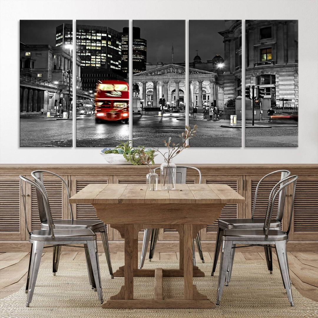 The London Night Red Bus Wall Art Canvas Print features a black and white cityscape with a moving red double-decker bus, crafted on museum-quality canvas with a UV-protective coating. This ready-to-hang artwork is designed to stand out and enhance any space.