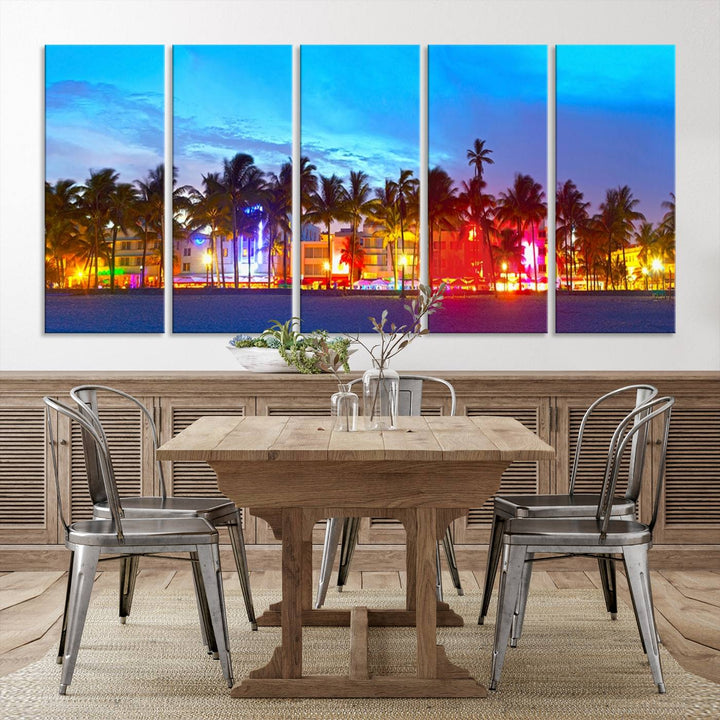 The living room features a three-panel Miami City Wall Art Canvas Print, showcasing a colorful, illuminated beach scene with palm trees on museum-quality canvas.