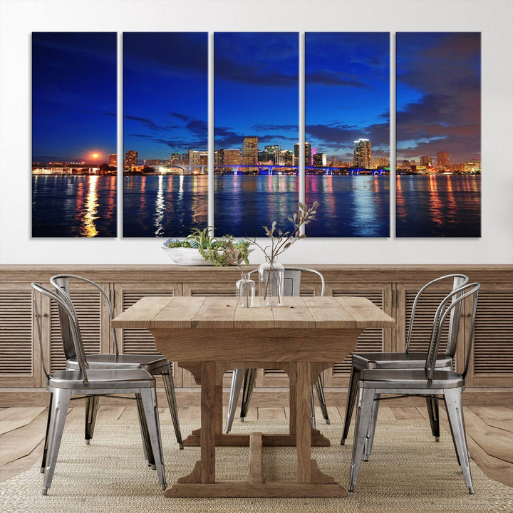 A large Miami City View Wall Art Canvas Print featuring the Miami City Skyline Panorama at night is displayed above the dresser.