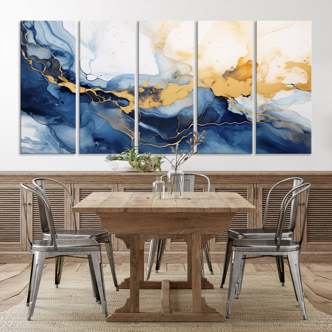 A contemporary living room featuring the "Navy Blue Gold Abstract Wall Art Canvas Print" on the wall, displayed on a gallery-wrapped, museum-quality canvas.