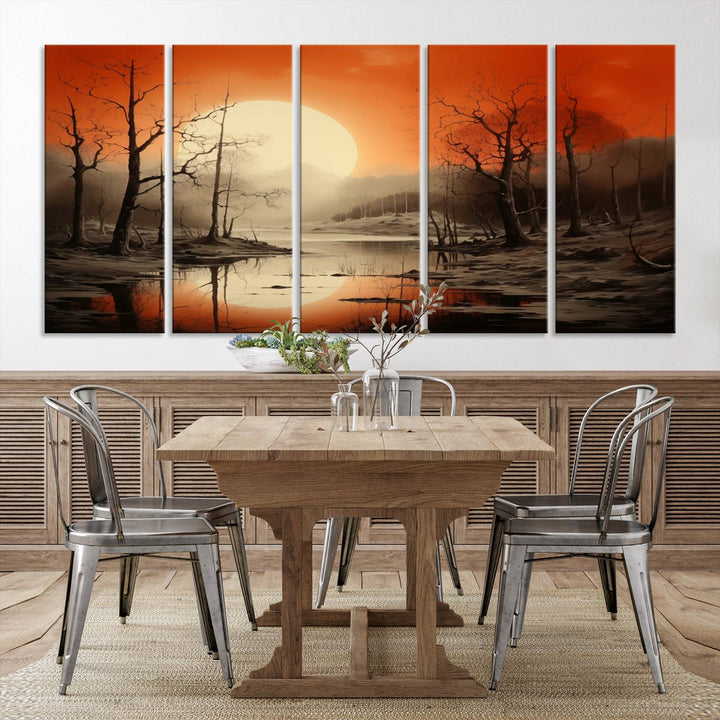 The "Abstract Watercolor Trees and Sunset on Lake Wall Art" is a triptych masterpiece, showcasing an orange-hued landscape of barren trees and a large sun. Displayed on museum-quality canvases with UV-protective coating, it creates a striking visual element in any space.