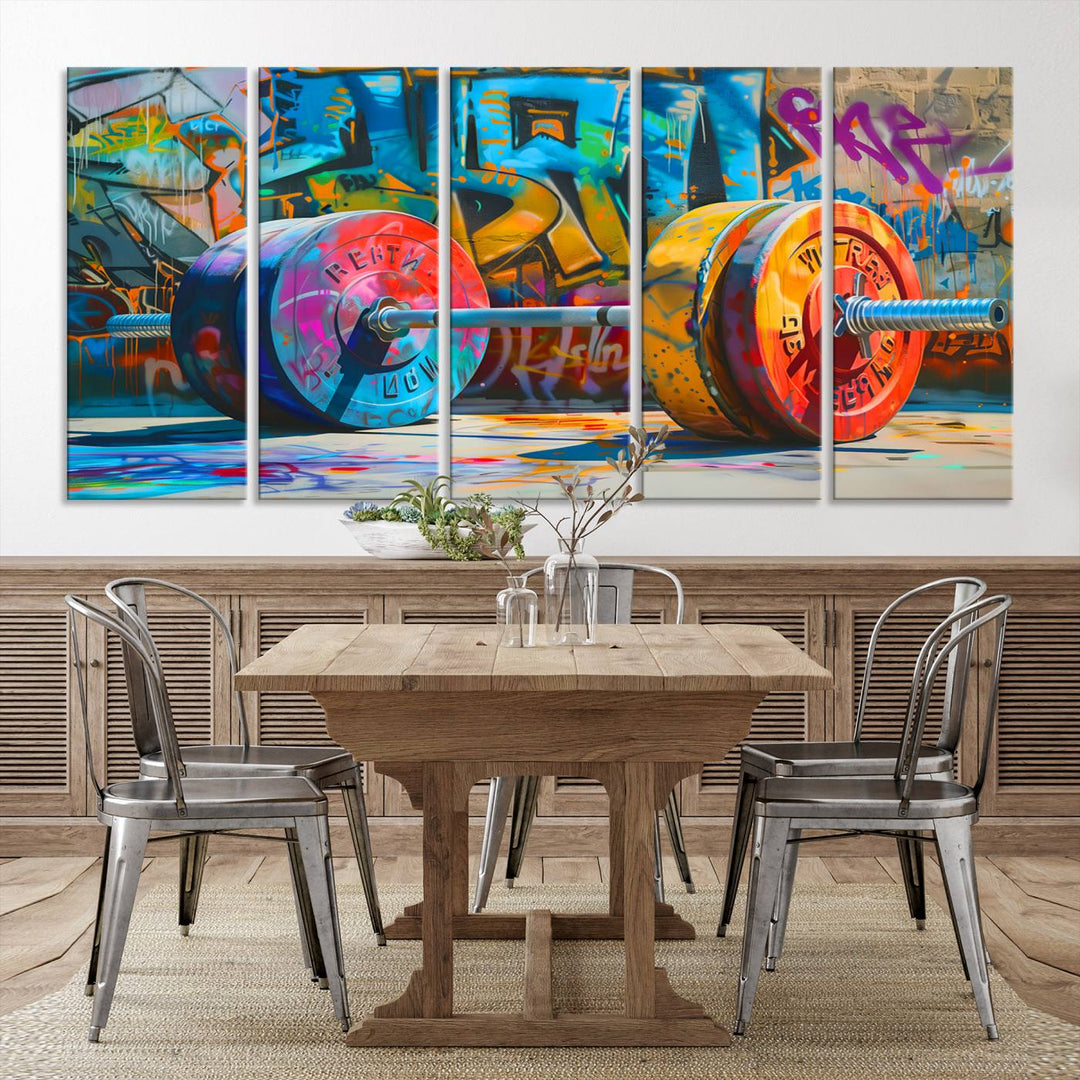 The Fitness Gym Barbell Graffiti Wall Art Canvas Print, a vibrant triptych featuring a barbell against a graffiti backdrop, elegantly hangs in the room. Crafted on premium canvas with a gallery-quality finish, this stunning piece of wall art effortlessly combines urban flair with sophisticated decor.