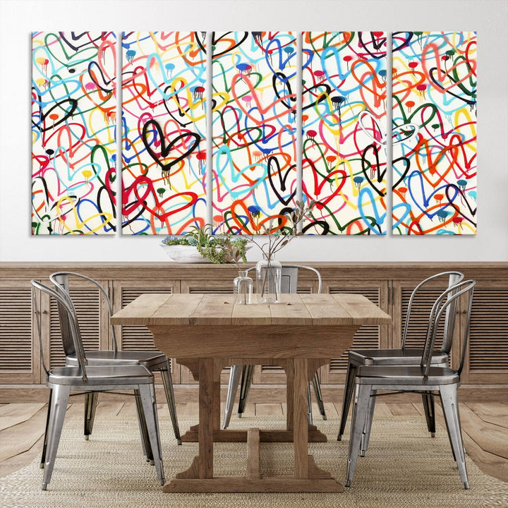 The "Colorful Love Canvas print," featuring vibrant abstract street art with overlapping loops, is handmade in the USA.