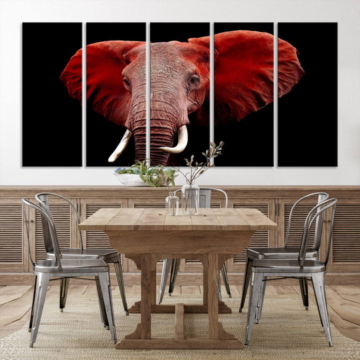 A Wall Art Canvas Print in the modern living room features a three-panel premium design of a red elephant face.