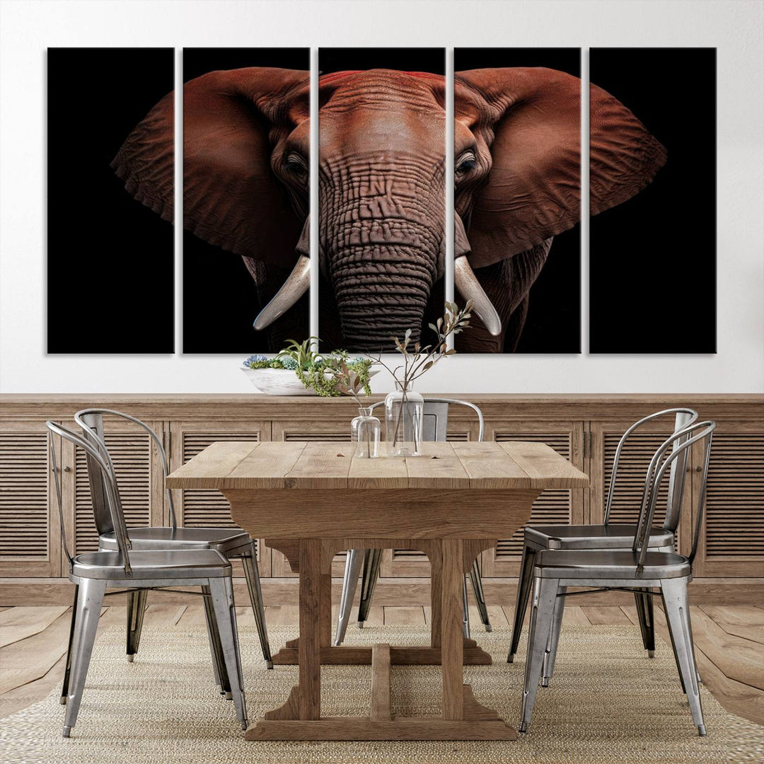 A stunning triptych titled "Wild Elephant Wall Art Canvas Print" beautifully enhances the wall above a contemporary living room. This Africa Savannah Wild Animal Wall Decor Print is of museum-quality, complete with a UV-protective coating to ensure its vibrancy and beauty are preserved for years.