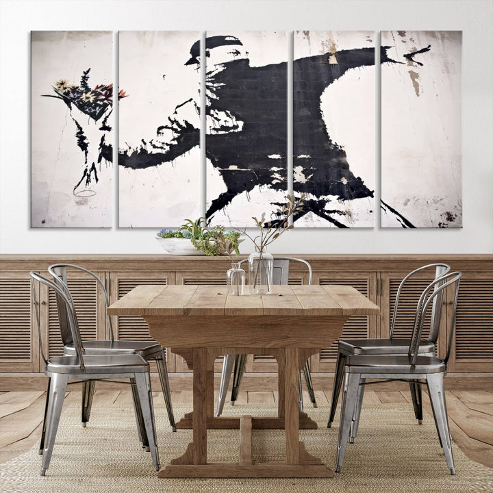 The living room features a split-panel art piece named "Banksy Flower Throw Graffiti Street Wall Art Canvas Print," gallery wrapped on museum-quality polycotton canvas and accentuated by modern decor elements.