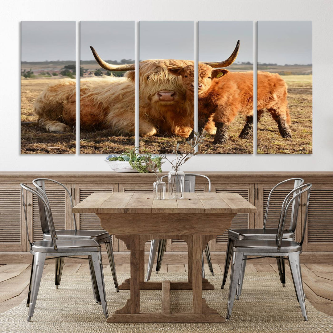 The three-panel canvas artwork, titled "Highland Cow Canvas Wall Art Animal Print for Farm House Decor," features a serene scene of a resting Highland cow and calf in a field. The piece highlights its gallery-quality finish.