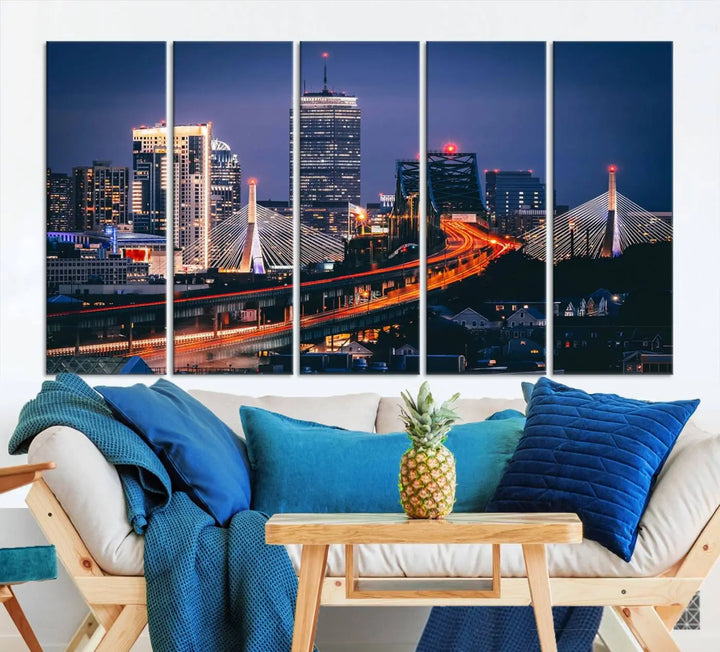 The "Boston City Lights Night Skyline Cityscape View" artwork on the wall showcases a brightly lit bridge at night. It is displayed on museum-quality canvas with a UV-protective coating.