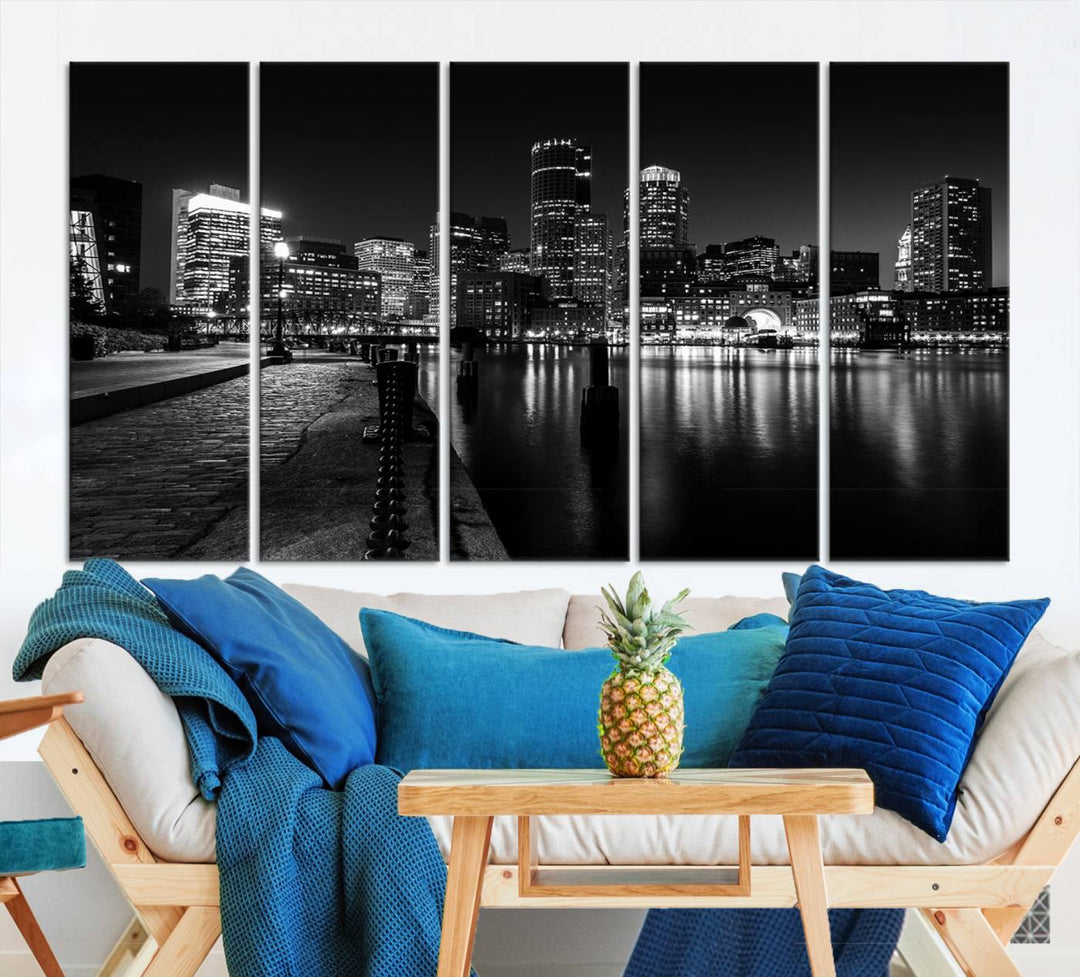 The Boston Lights Skyline Black and White Wall Art Cityscape Canvas Print, crafted with museum-quality canvas and UV-protective coating, serves as a striking triptych centerpiece in the living room.