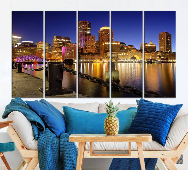 The "Boston City Night Skyline Cityscape View Wall Art Canvas Print" beautifully portrays a stunning triptych of a city skyline illuminated against the night sky, elegantly reflected in the river below. These museum-quality canvases are gallery wrapped to ensure an elegant presentation that enhances any space.