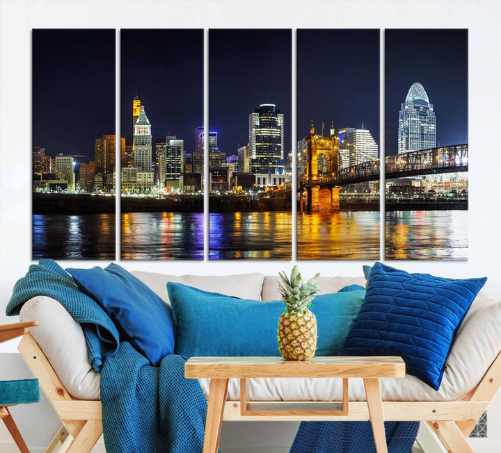 The Cincinnati City Lights Night Skyline Cityscape View Wall Art Canvas Print, crafted on museum-quality canvas with UV-protective coating and ready to hang, adds a touch of sophistication to the wall.