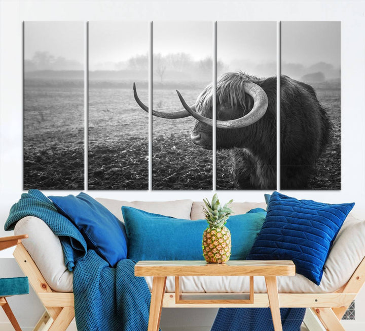 The living room features a three-panel wall art of a highland cow in a foggy field, using the Cow Wall Art Canvas Print for visual impact. This museum-quality canvas includes UV-protective coating to ensure longevity.