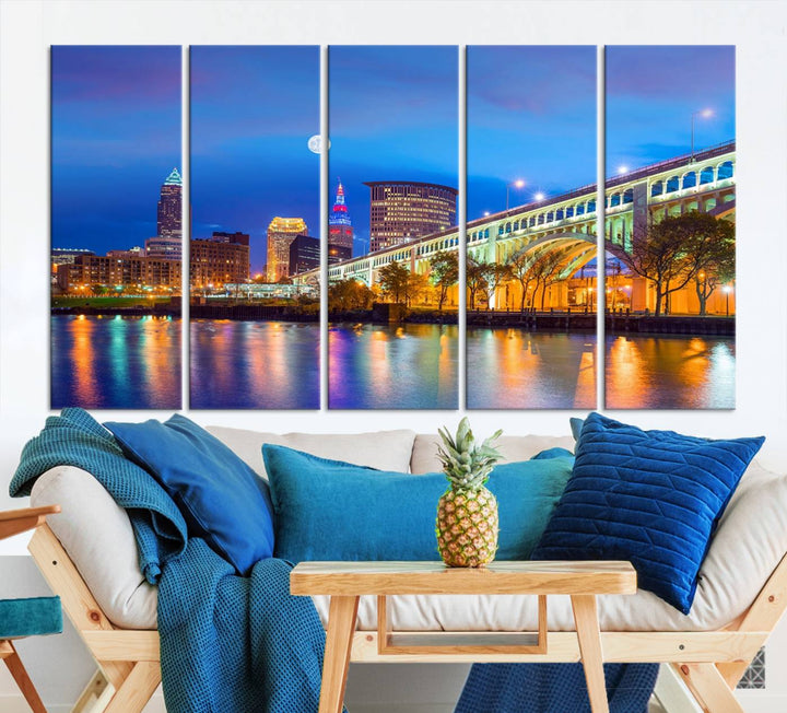 The Cleveland Night Skyline Wall Art City Cityscape Canvas Print portrays a city skyline and bridge lit up against the night sky. This artwork is printed on museum-quality canvas with a gallery-wrapped finish and features a UV-protective coating to ensure lasting vibrancy.