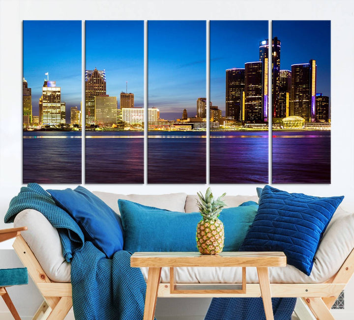 The living room features a breathtaking canvas print titled "Detroit City Lights Night Bright Blue Skyline Cityscape View," presented in a stunning triptych format on museum-quality canvases that are ready to hang.