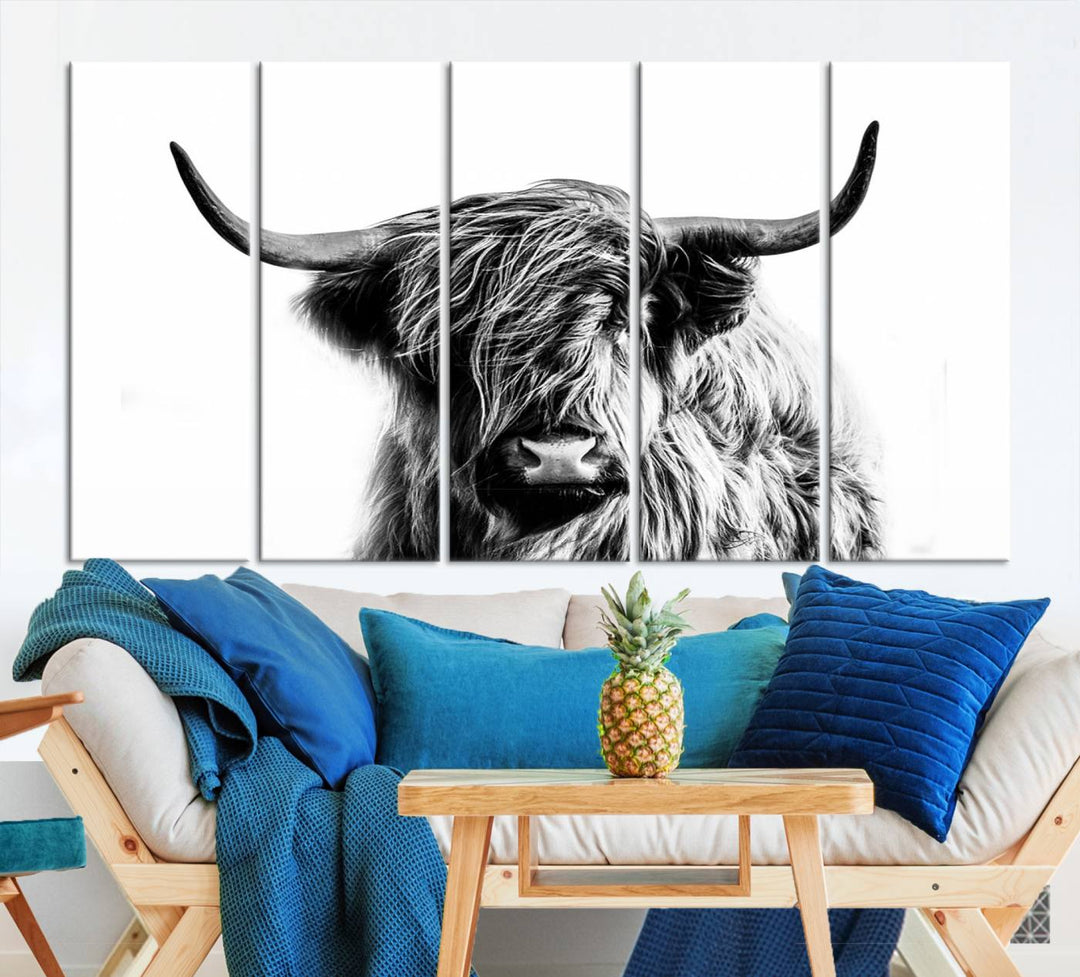 The Scottish Highland Cow Cattle Art Print Farmhouse Wall Art Canvas Print enhances rustic farmhouse decor with its depiction of a long-haired, large-horned cow. This triptych is an ideal choice for chic wall art.