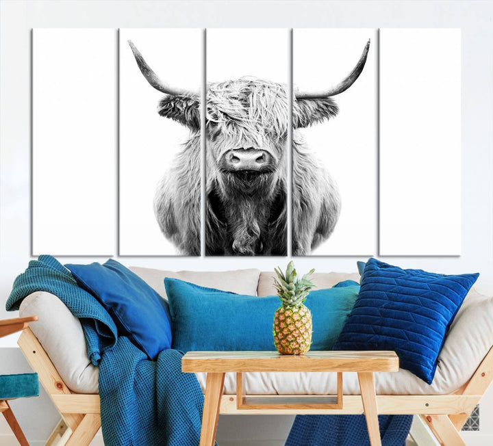 The wall art features a triptych of a Scottish Highland cow, printed on museum-quality canvases with a UV-protective coating. This decorative piece is known as the Highland Cow Canvas Wall Art Farm House Wall Art.