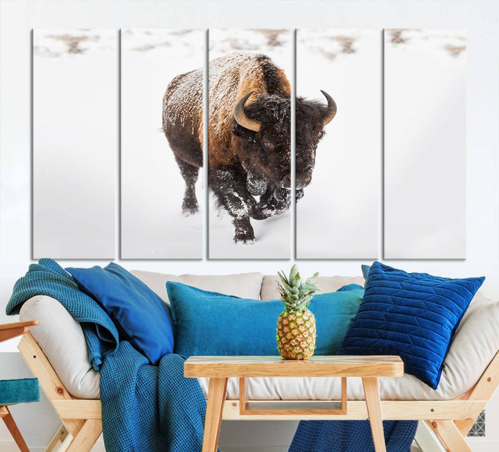 The Bison Winter Wall Art Canvas Print for Farmhouse Decor is displayed as a triptych in the living room. This artwork, printed on museum-quality canvases with a UV-protective coating to maintain its vibrant colors, is the focal point of the space.