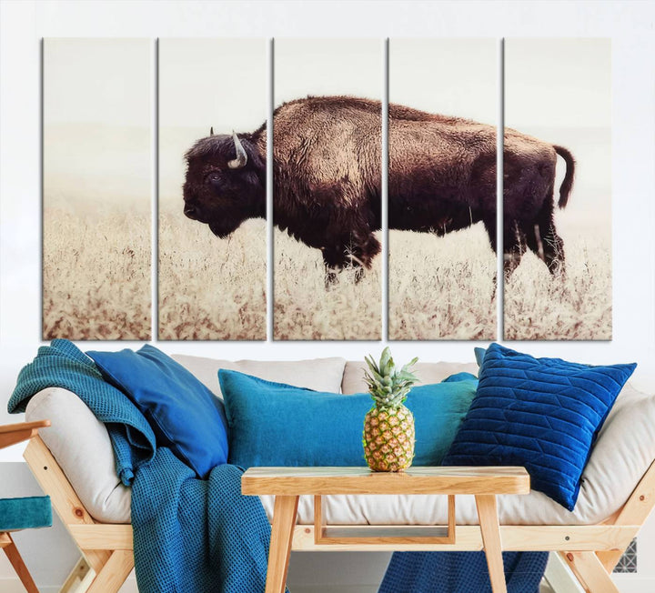 A stylish living room showcases the captivating "Bison in Field" Wall Art Canvas Print as farmhouse decor.