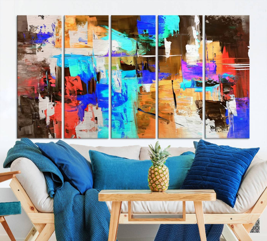 In a modern living room, the "Colorful Abstract Wall Art Canvas Print" serves as a stunning triptych centerpiece on museum-quality canvas, ready to hang. Its UV-protective coating ensures enduring vibrancy.