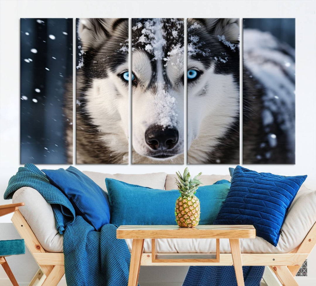 A digital art piece titled "Winter Siberian Husky Wolf Wall Art Canvas Print" showcases a blue-eyed husky blanketed in snow. Printed on high-quality canvas, it is an ideal choice for nature and dog enthusiasts.