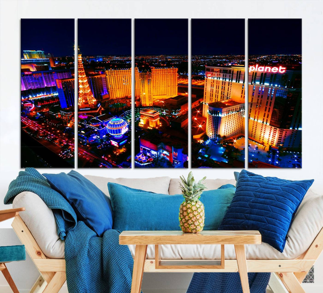 Las Vegas Wall Art Canvas Print showcases a dynamic and luminous cityscape at night with tall buildings and bustling streets. Expertly printed on museum-quality canvas, this gallery-wrapped artwork is enhanced with a UV-protective coating to ensure lasting brilliance.