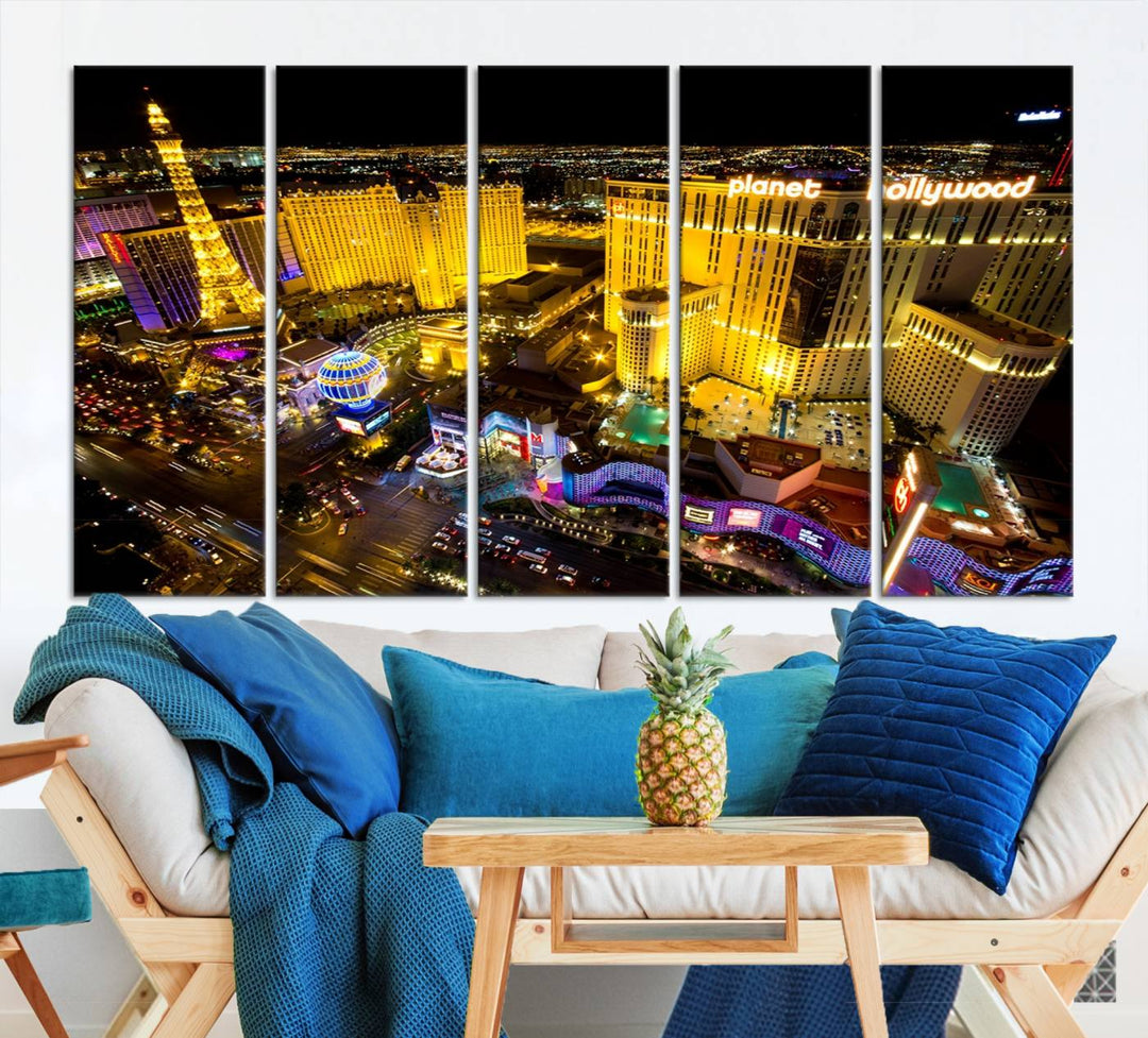 The modern living room features a Las Vegas Wall Art Canvas Print, a museum-quality triptych showcasing a vibrant cityscape with neon lights.