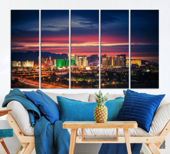 The living room is adorned with the Las Vegas Wall Art Canvas Print, a triptych showcasing a cityscape at sunset. This piece is crafted on museum-quality canvas and protected by a UV-coated finish, highlighting the craftsmanship of a skilled professional.