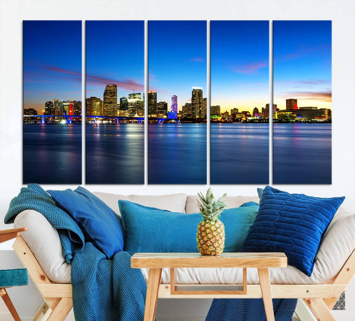 The living room features a Miami City Wall Art Canvas Print—a gallery-wrapped triptych displaying a city skyline at dusk, adding museum-quality elegance to the space.