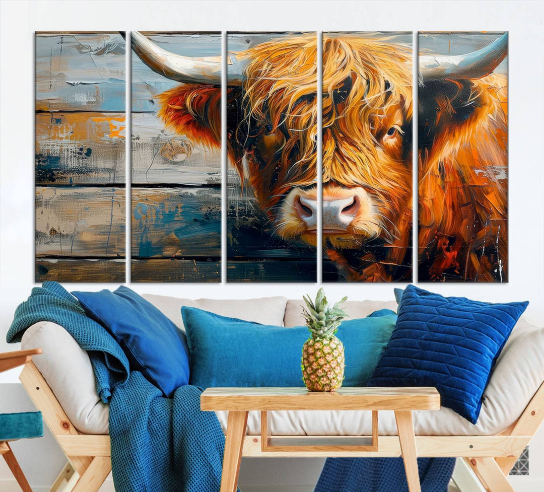 The Highland Cow Abstract Canvas Wall Art, a bold piece of farmhouse rustic decor, adds charm to the modern living room.